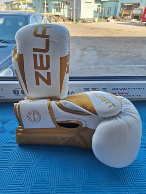 Боксерські рукавиці шкіряні полупрофесійні Zelart-12 12zelartgood фото
